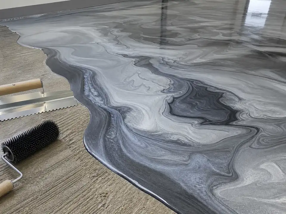 metallic epoxy flooring atlanta installation process showing pigment movement